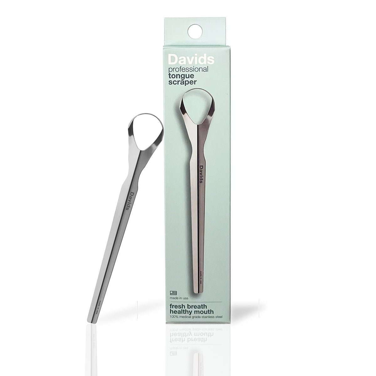 Davids professional tongue scraper shown beside its mint green packaging